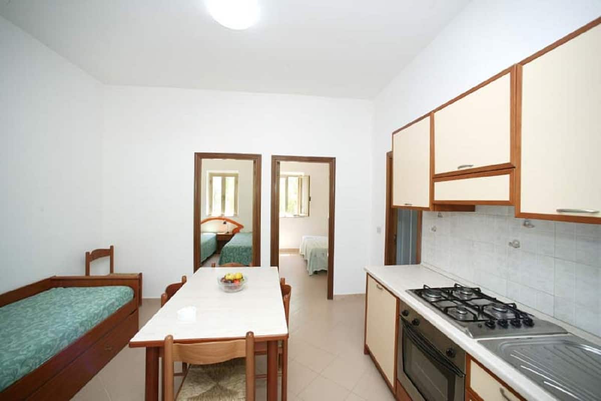 Apartment, 2 Bedrooms (trilocale) | Private kitchen | Full-sized fridge, stovetop, freezer