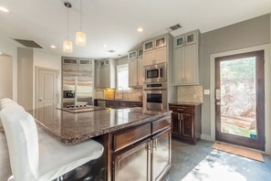 Fridge, microwave, oven, stovetop - Luxury Lake Travis Waterfront River Retreat: Heated pool, yard, pool table (Spicewood)