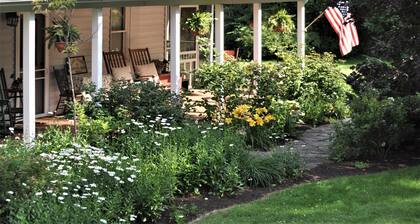 Two Bedroom Across from Outlet Pond on edge of village and wooded trails.