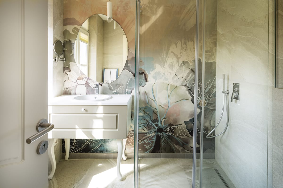 designer toiletries, hair dryer, bathrobes, slippers