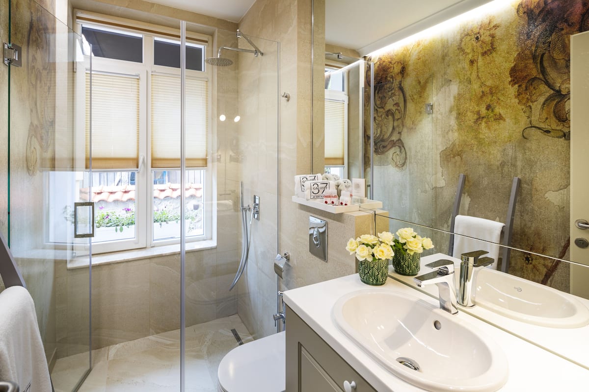 premium room | bathroom | designer toiletries, hair dryer, bathrobes, slippers