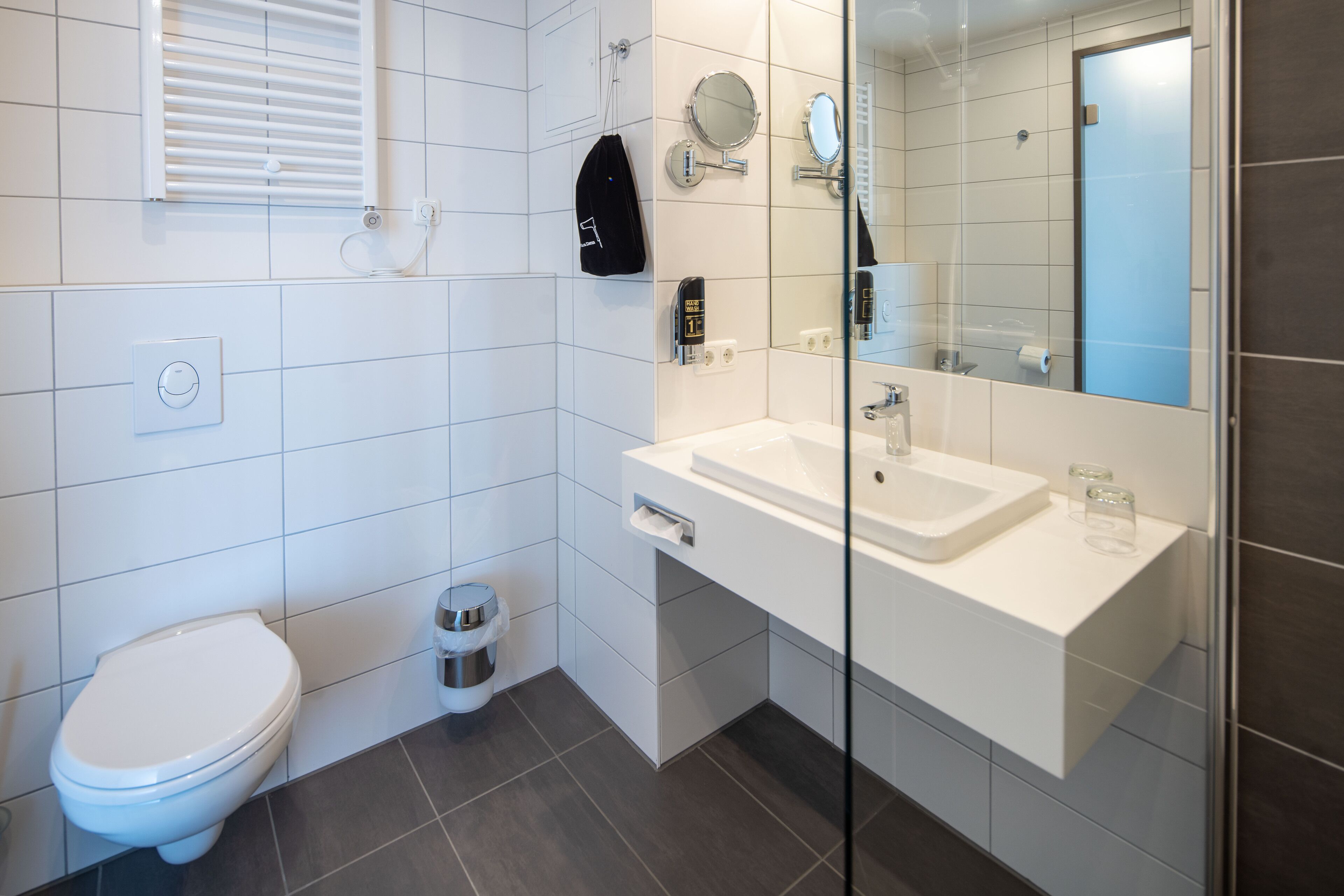 shower, eco-friendly toiletries, hair dryer, towels