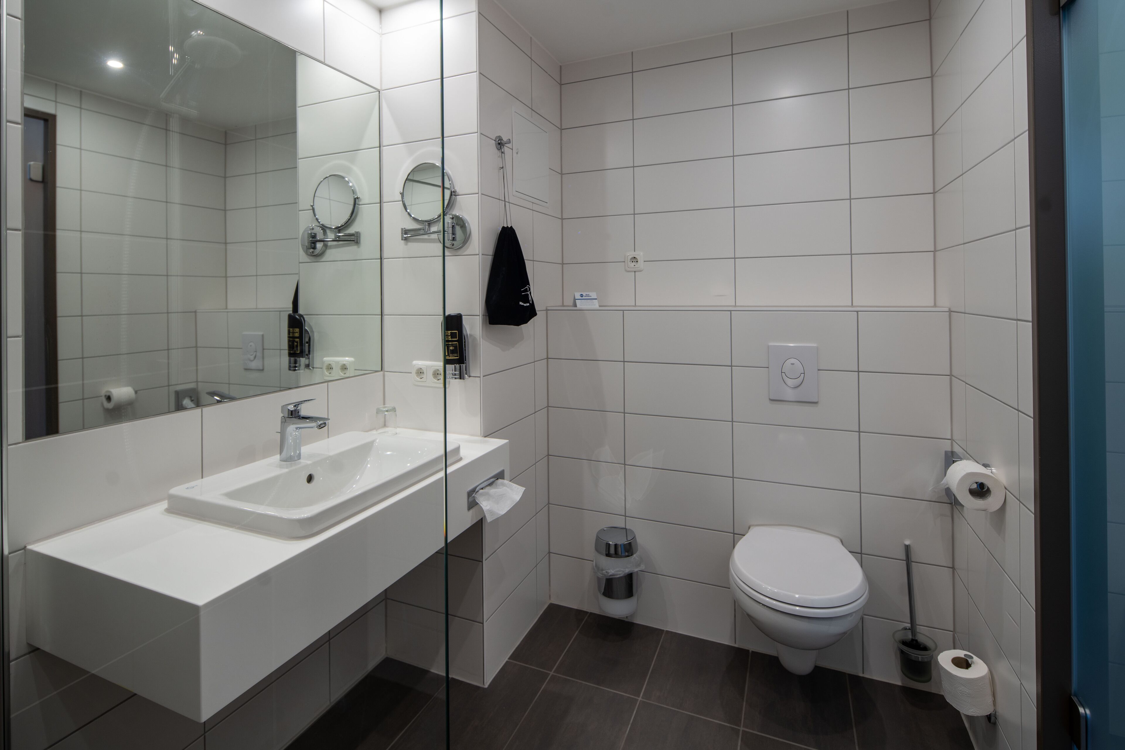 shower, eco-friendly toiletries, hair dryer, towels