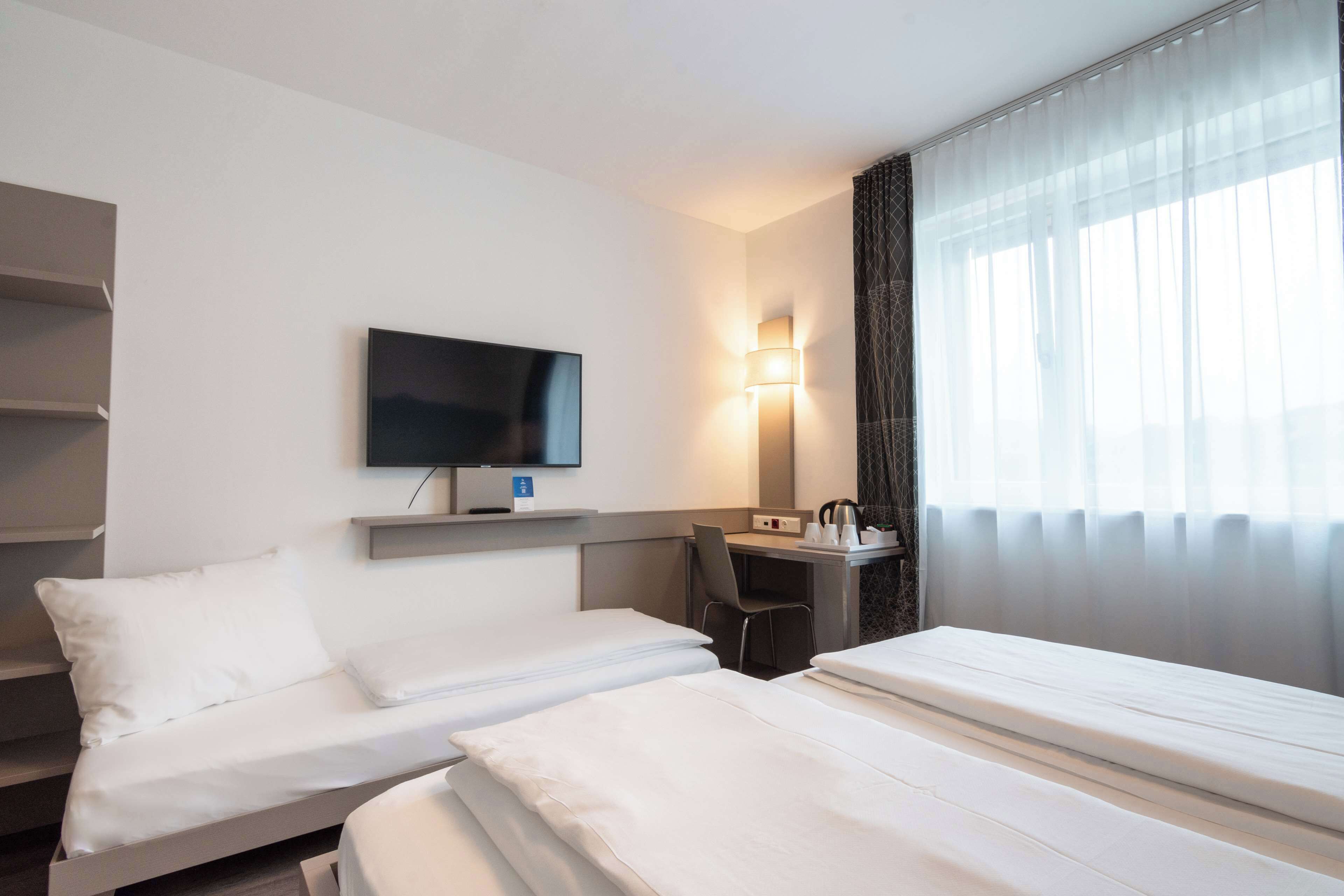 standard room, multiple beds (converts to 2 twin beds) | 1 bedroom, in-room safe, blackout curtains, free wifi