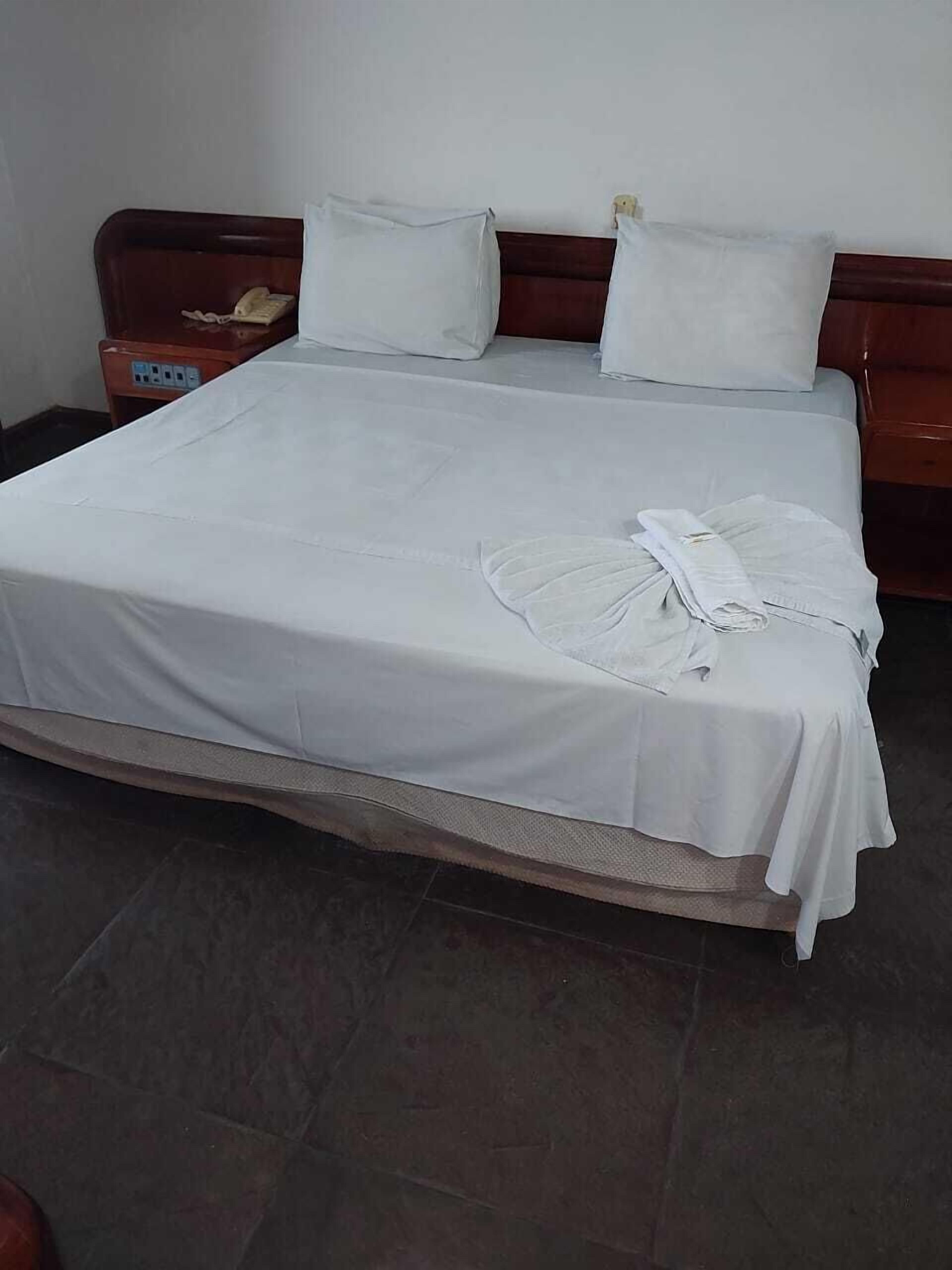 Minibar, desk, blackout drapes, iron/ironing board