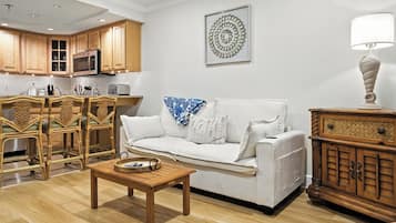 Apartment, 1 King Bed with Sofa bed | Living area | 36-inch flat-screen TV with cable channels, TV