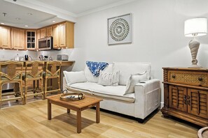 Apartment, 1 King Bed with Sofa bed | Living area | 36-inch flat-screen TV with cable channels, TV