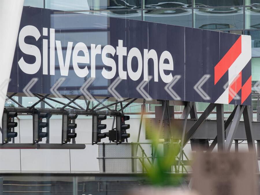 A building with a large sign reading 'Silverstone' and a number '18' on the wall.