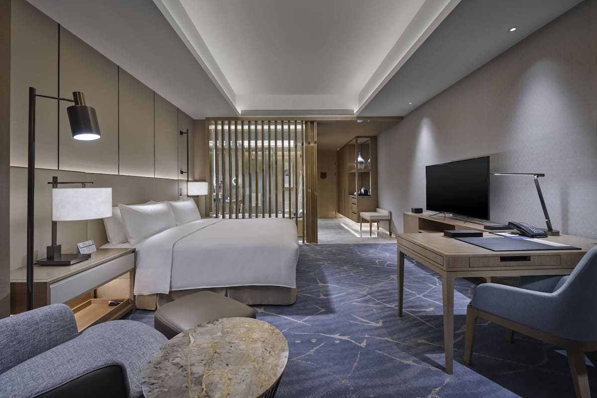 Premium bedding, down duvets, minibar, in-room safe