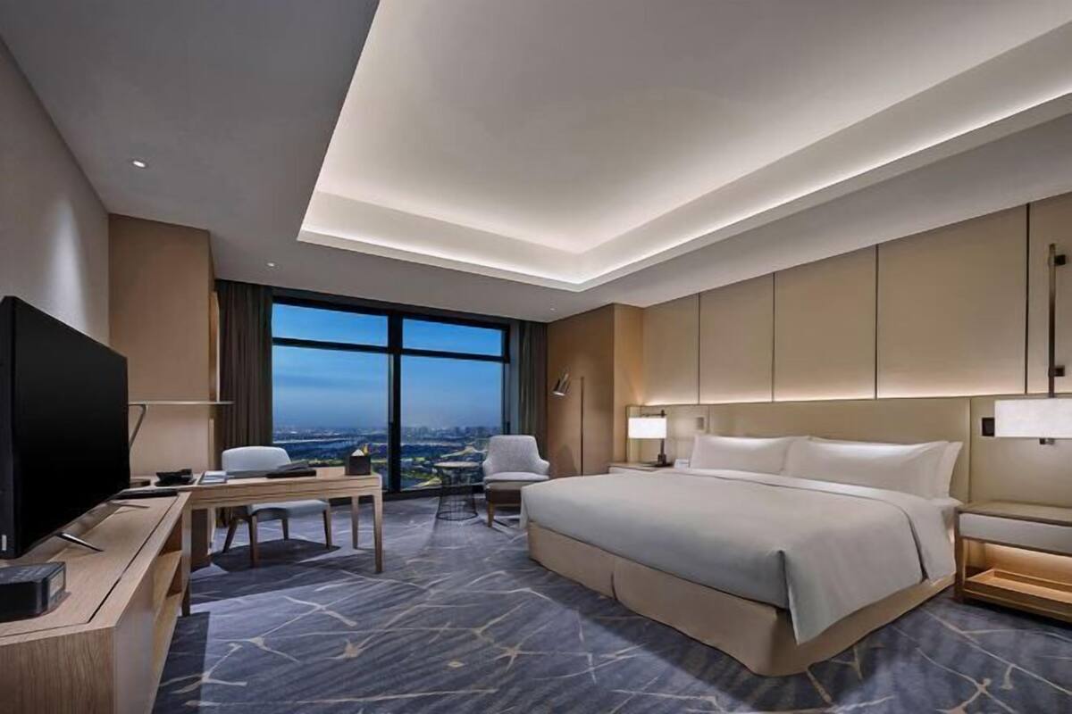 Ropa de cama de alta calidad, cubrecamas y minibar