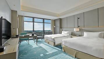 Premium bedding, down comforters, minibar, in-room safe