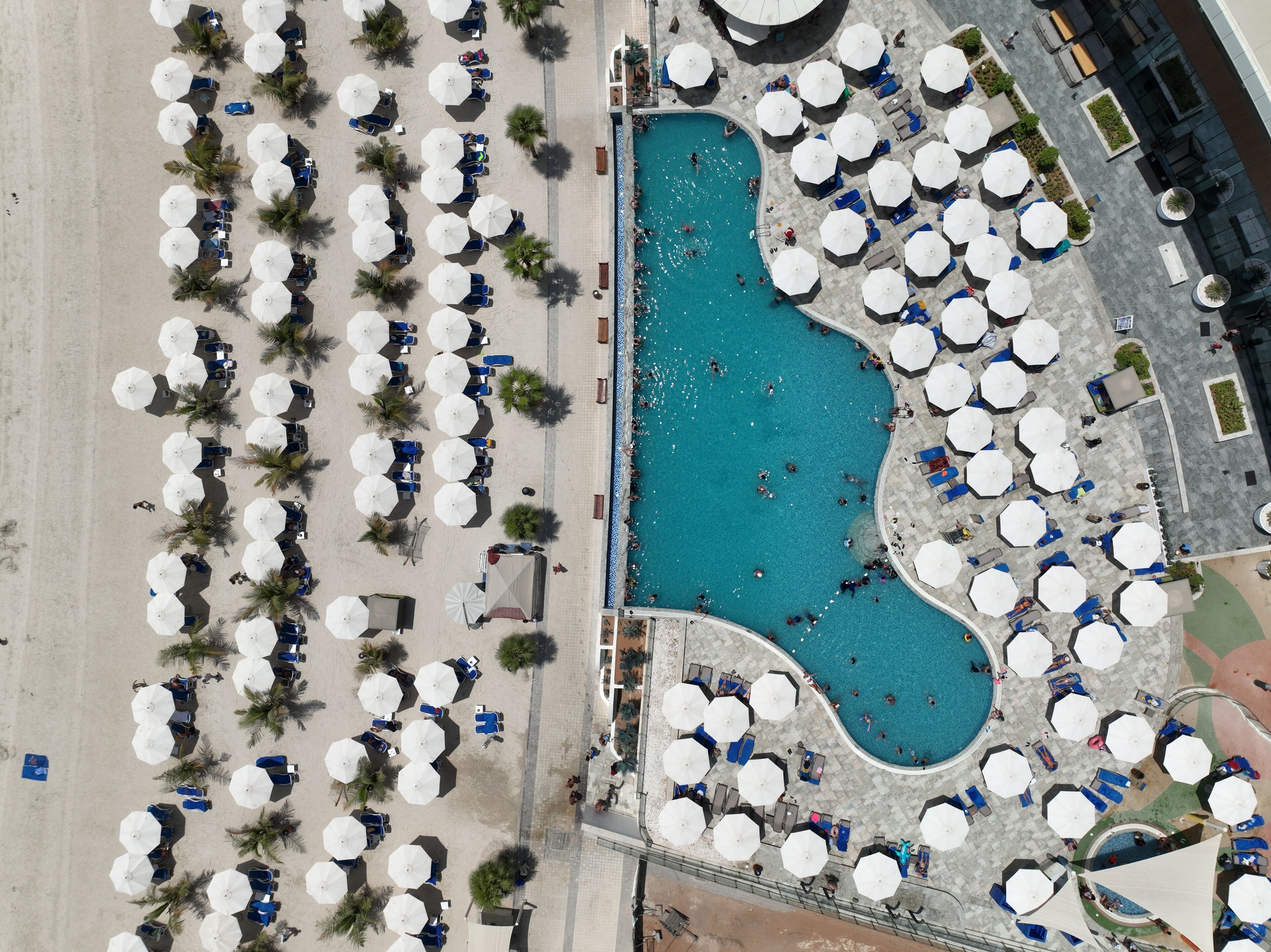 Outdoor pool, open 9:00 AM to 6:00 PM, pool loungers