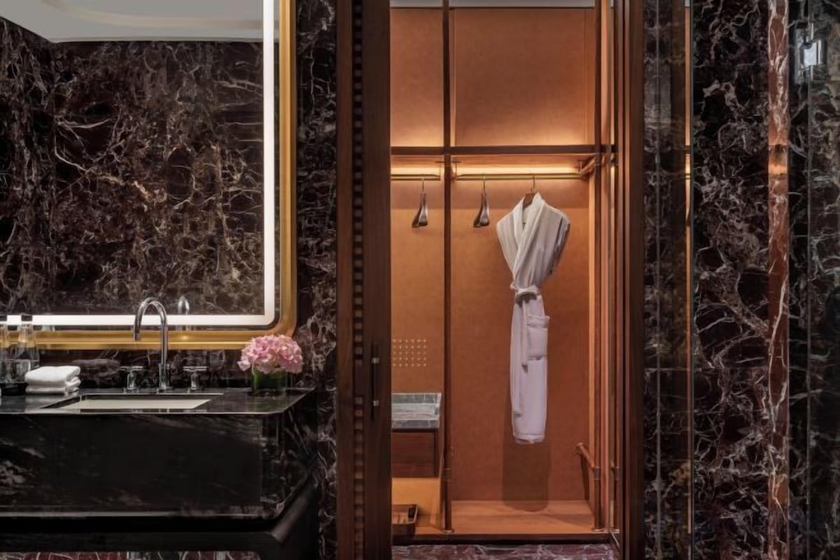 Separate tub and shower, rainfall showerhead, hair dryer, bathrobes