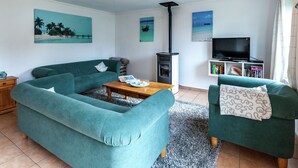 Ferienhaus | Wohnzimmer | Kamin, DVD-Player