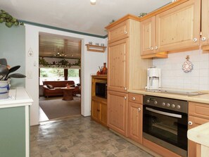 Appartement | Privékeuken | Een kinderstoel