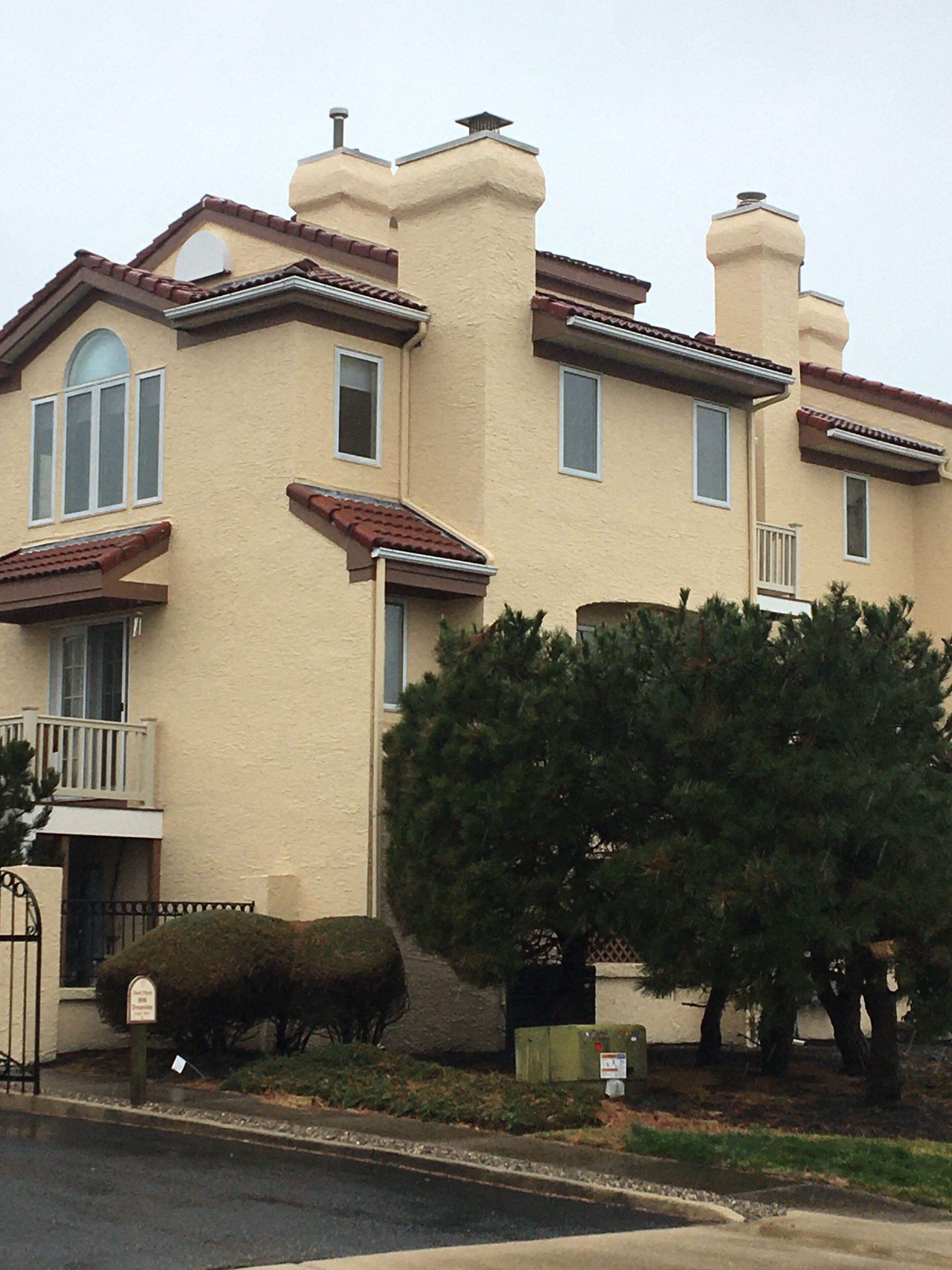 Sunny family owned corner unit town home one block from exclusive Diamond Beach