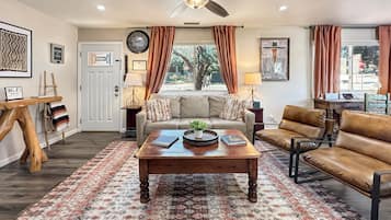 TV, fireplace, books
