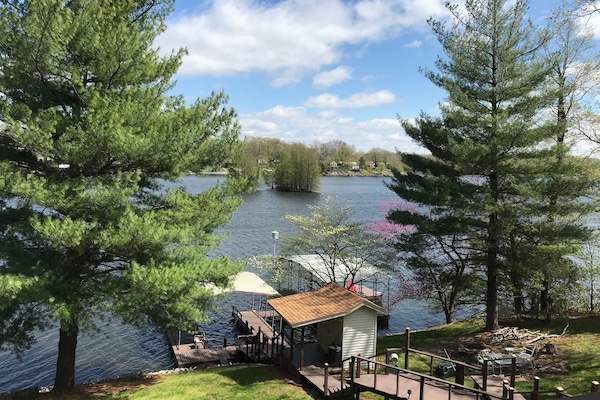 Upper level deck view of the lake & cypress trees