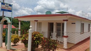 Enjoy a peaceful stay at Casa Jesus y Maria, featuring a covered porch and garden area.