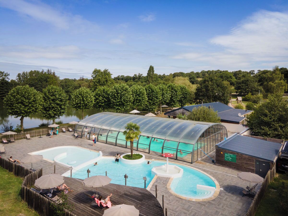 Indoor pool, seasonal outdoor pool, pool umbrellas, pool loungers