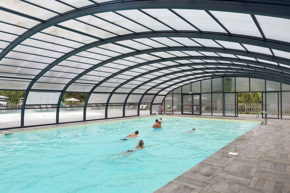 Indoor pool, seasonal outdoor pool, pool umbrellas, pool loungers