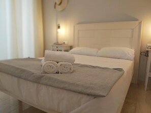 2 slaapkamers, een strijkplank/strijkijzer, internet, beddengoed