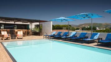 Outdoor pool, open 9:00 AM to 9:00 PM, free pool cabanas, pool umbrellas