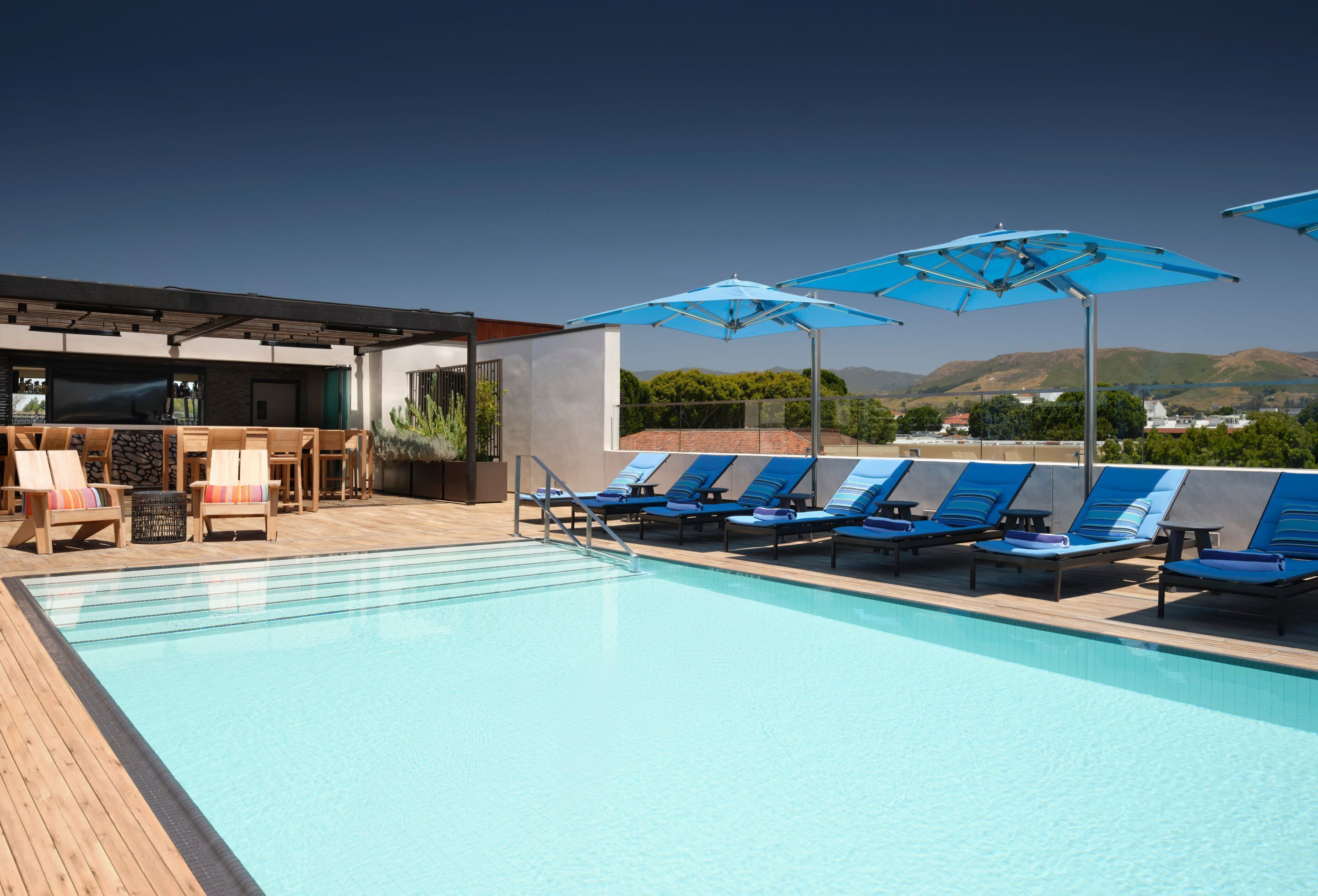 Outdoor pool, open 9:00 AM to 9:00 PM, free pool cabanas, pool umbrellas