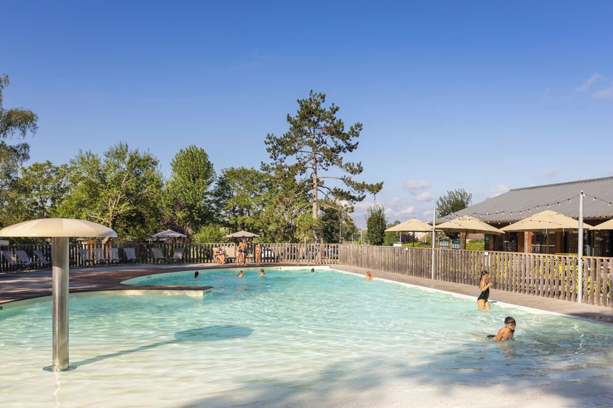 Seasonal outdoor pool, open 9:00 AM to 6:00 PM, pool umbrellas