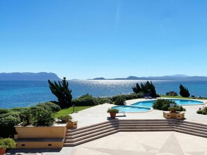 Enjoy a serene view of the expansive body of water from this secluded spot.