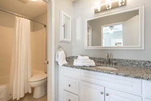 Combined shower/tub, hair dryer, towels, soap
