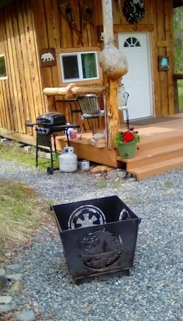 Property grounds. One bedroom cabin with inside toilet and stand up loft. PET FRIENDLY!