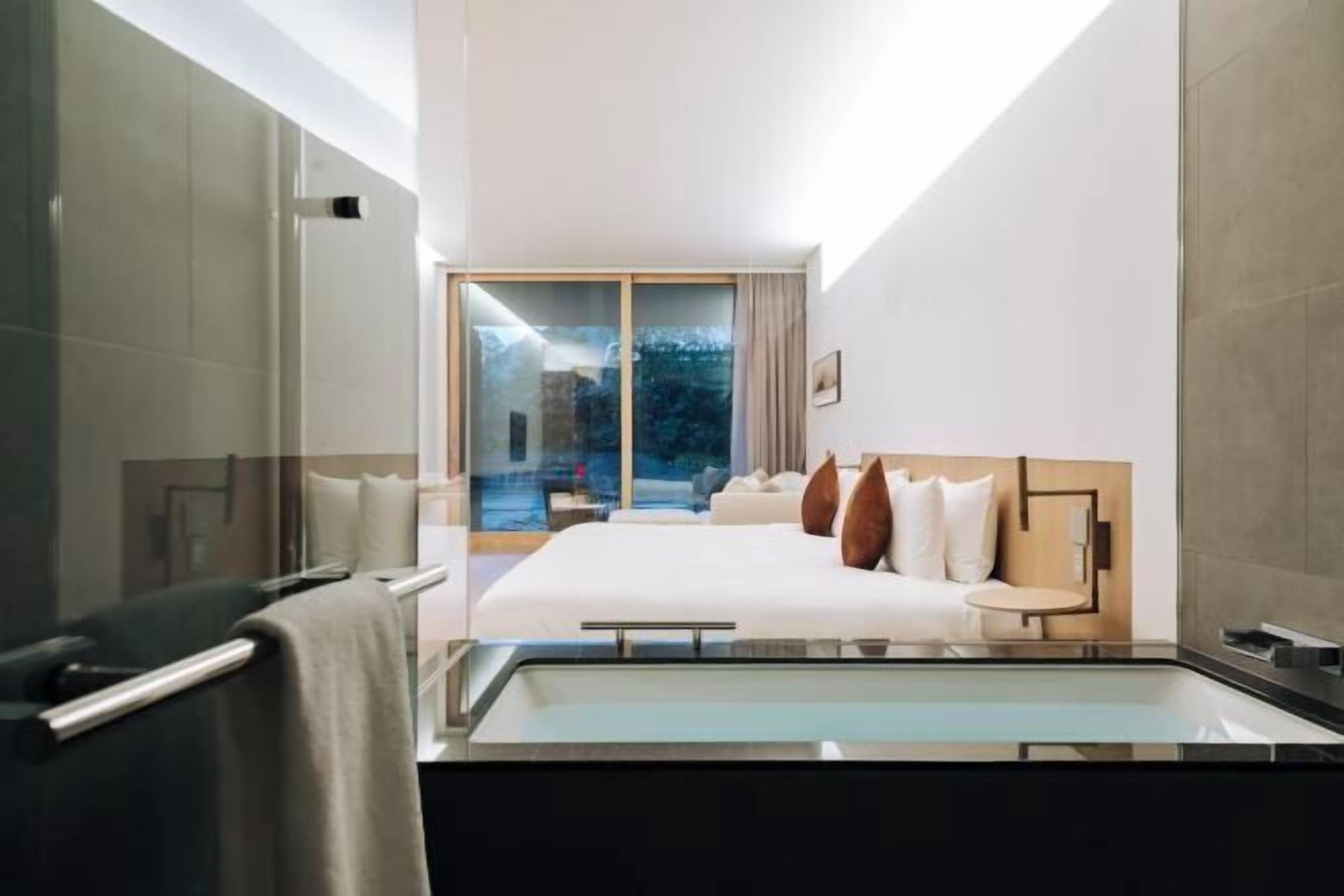 Egyptian cotton sheets, premium bedding, down duvets, free minibar items