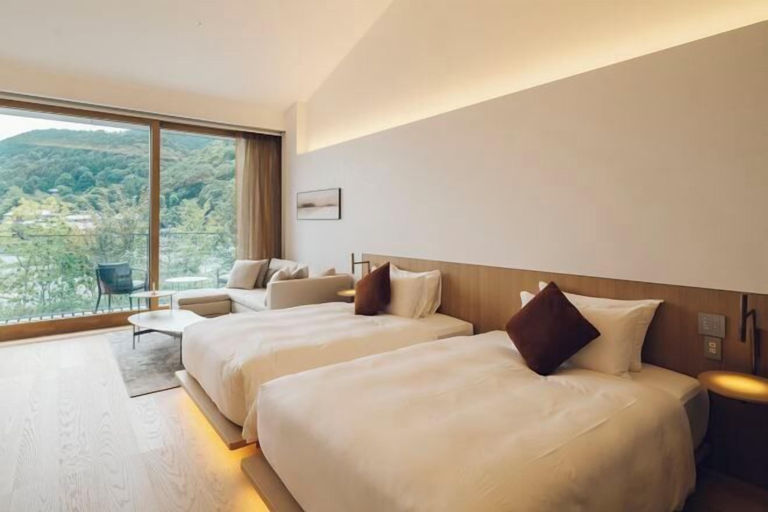 Egyptian cotton sheets, premium bedding, down duvets, free minibar items