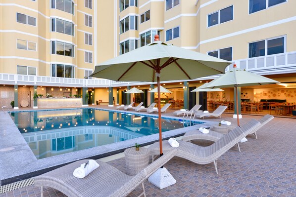 Outdoor pool, open 8:00 AM to 7:00 PM, pool umbrellas, pool loungers