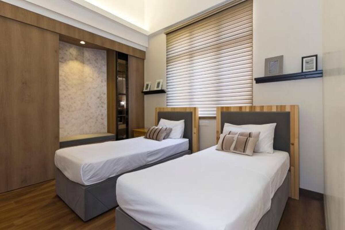 Desk, laptop workspace, bed sheets