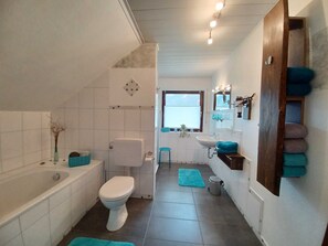 Hair dryer, towels, soap, toilet paper