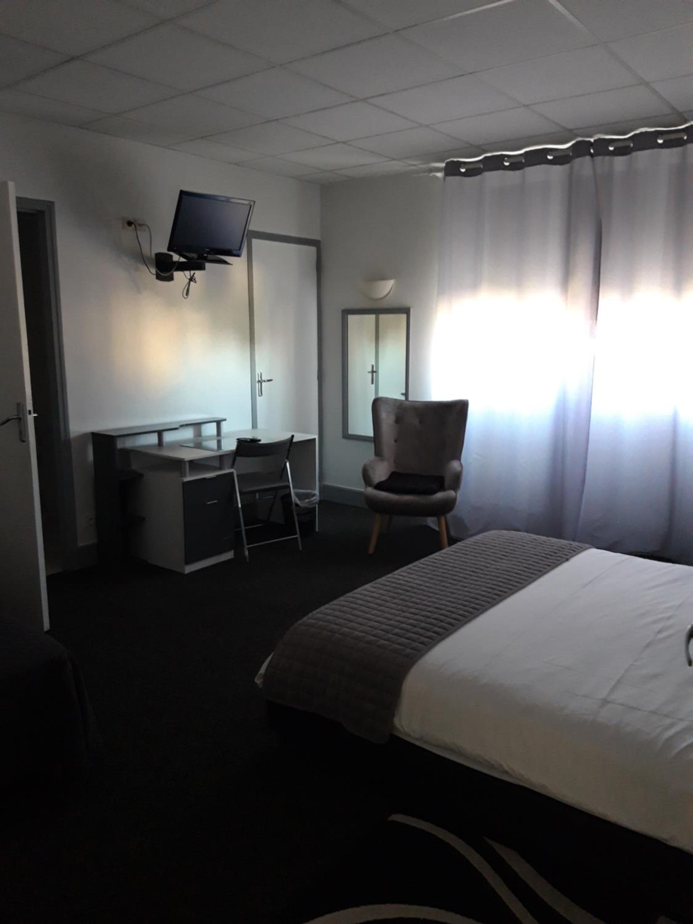 individually decorated, individually furnished, desk, blackout curtains