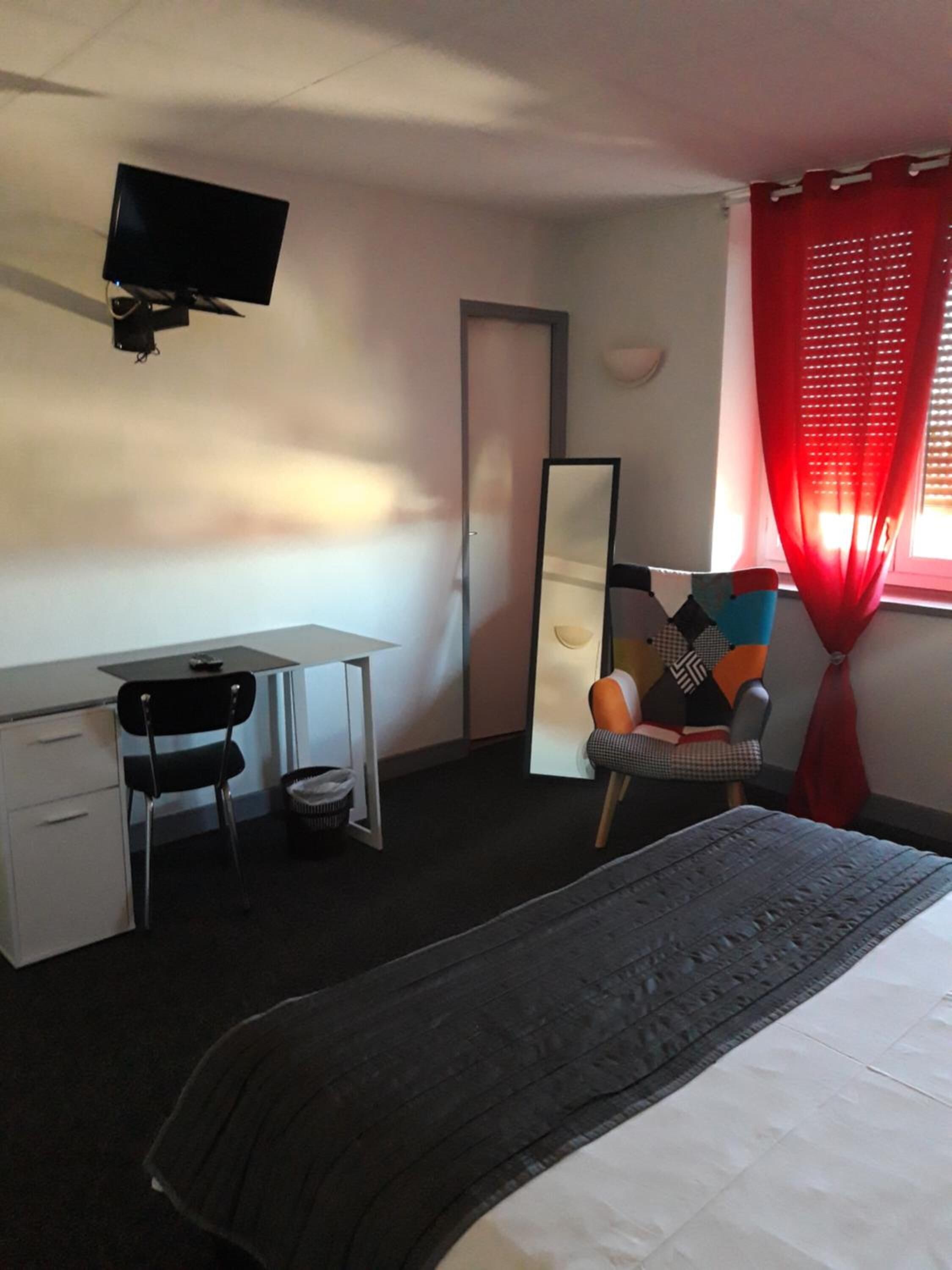 individually decorated, individually furnished, desk, blackout curtains