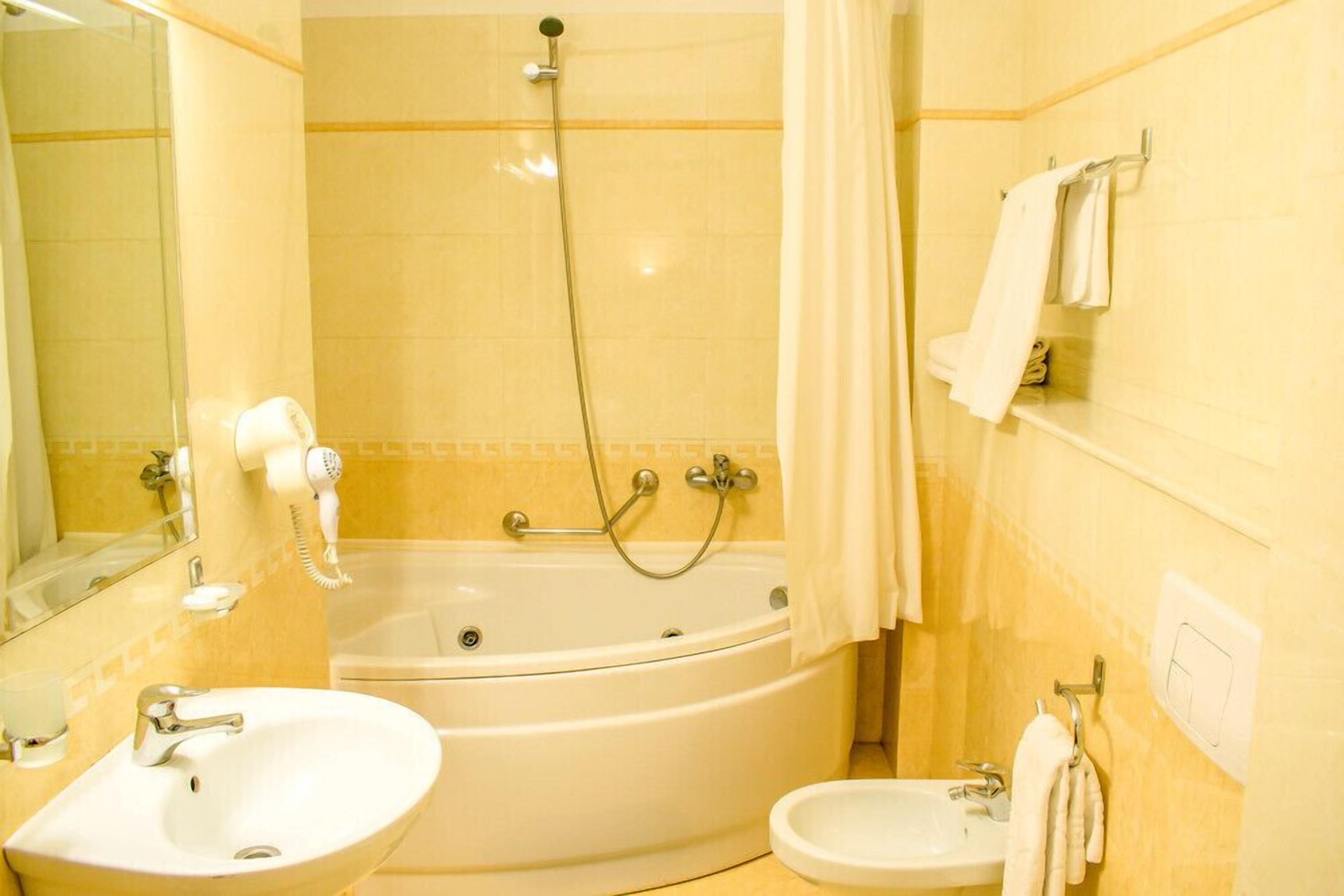 jetted bath, free toiletries, hair dryer, bathrobes