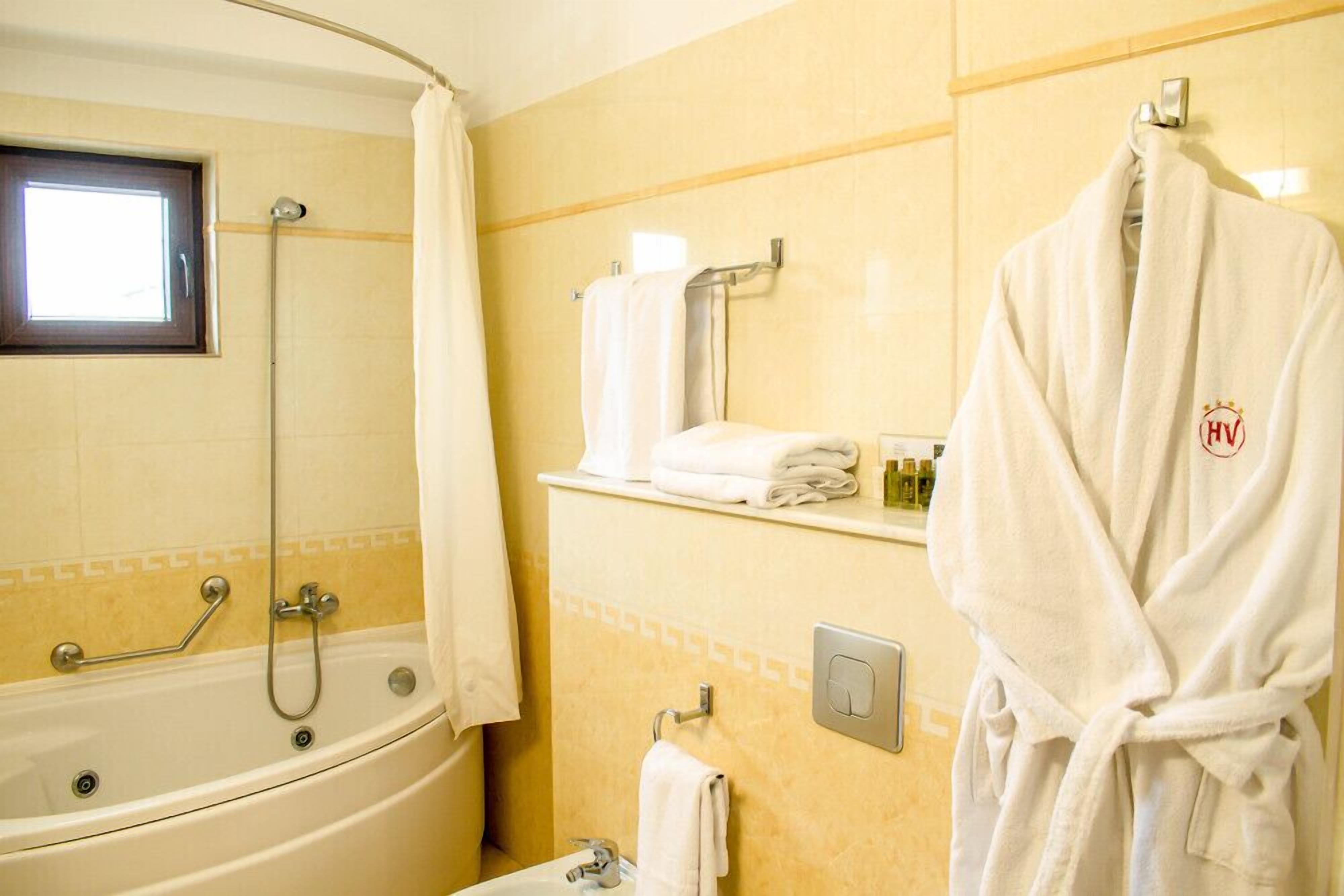 jetted bath, free toiletries, hair dryer, bathrobes