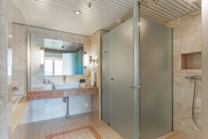 Shower, hair dryer, bathrobes, towels