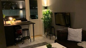 Departamento | Área de sala de estar | Televisión de pantalla plana 