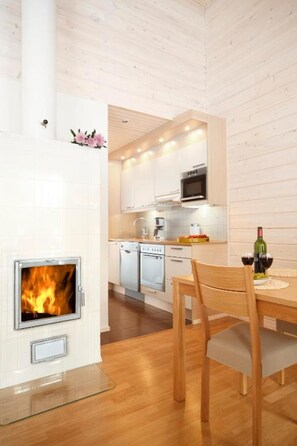 Apartment, Sauna (68 m2) | Private kitchen | Fridge, microwave, oven, stovetop