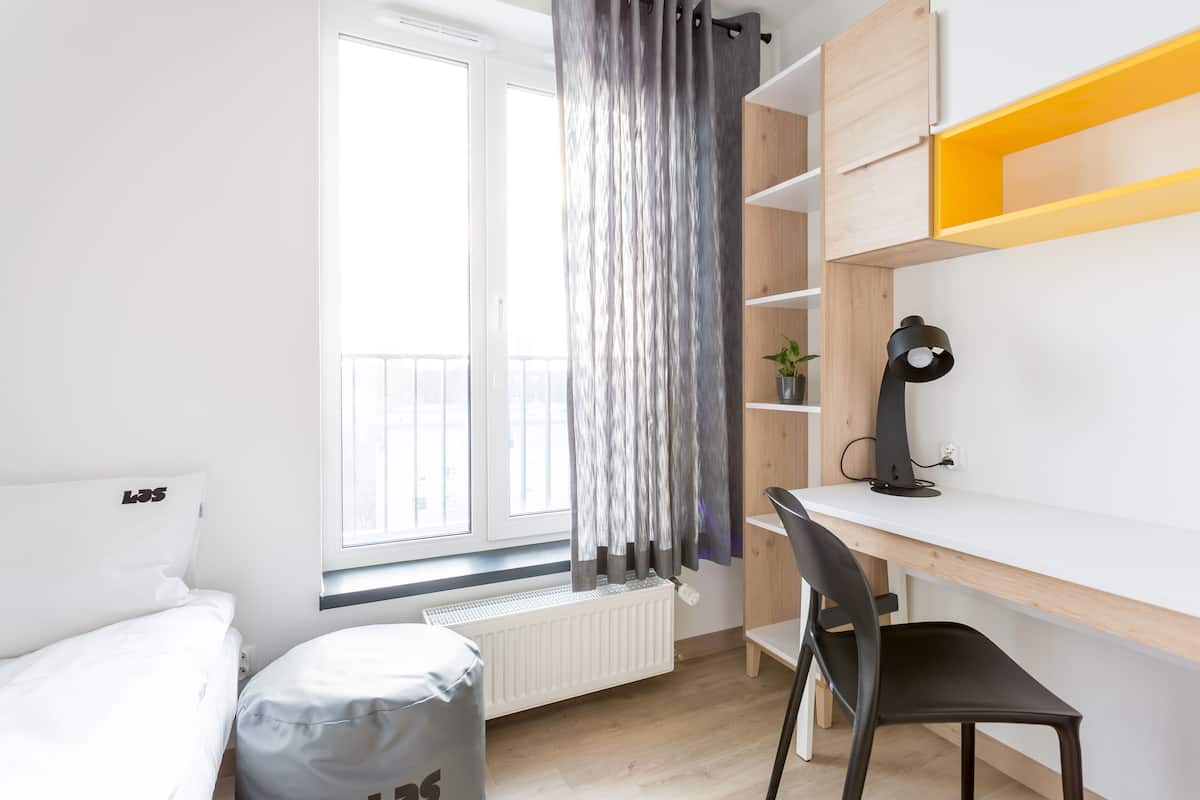 Chambre Simple | Coin séjour