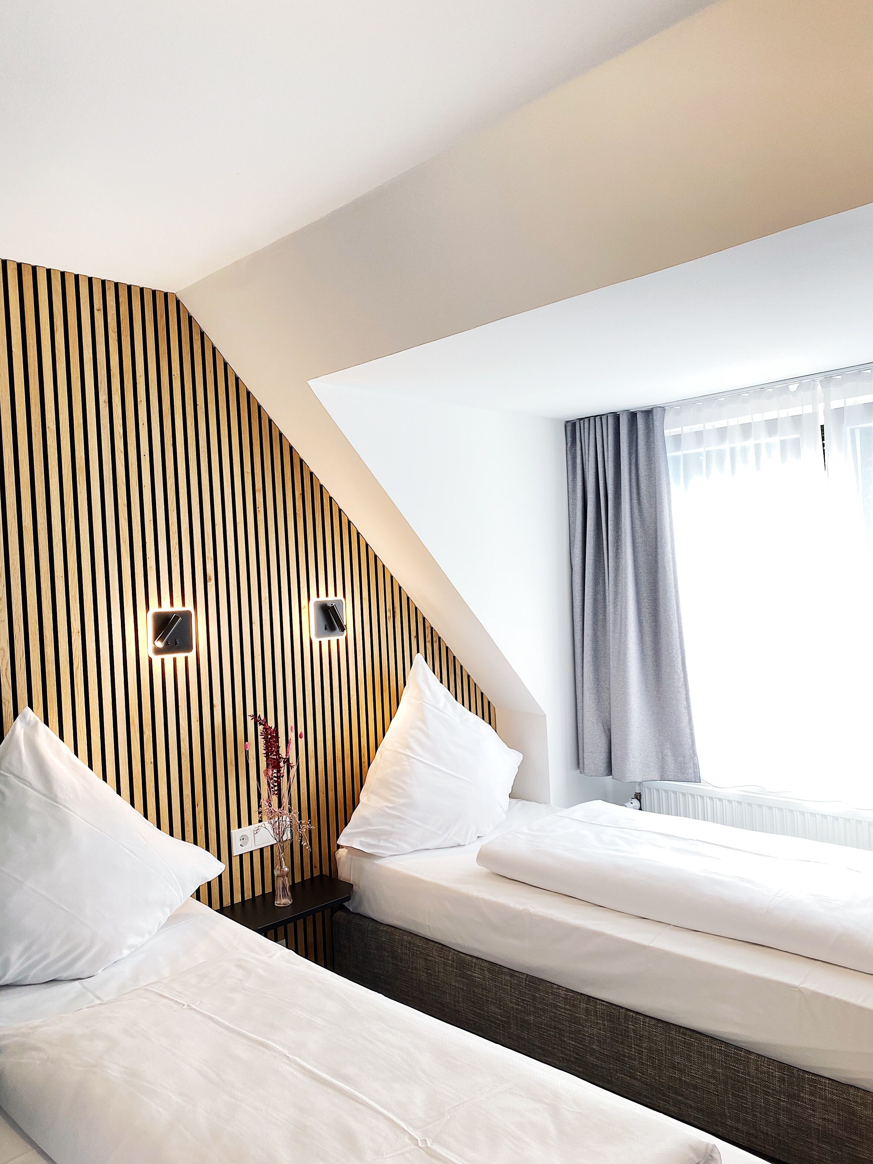 twin room | minibar, in-room safe, desk, blackout curtains