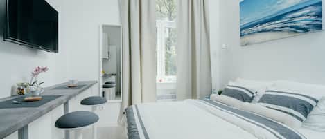 Habitación doble, cocineta (3) | 1 habitación, wifi gratis y ropa de cama