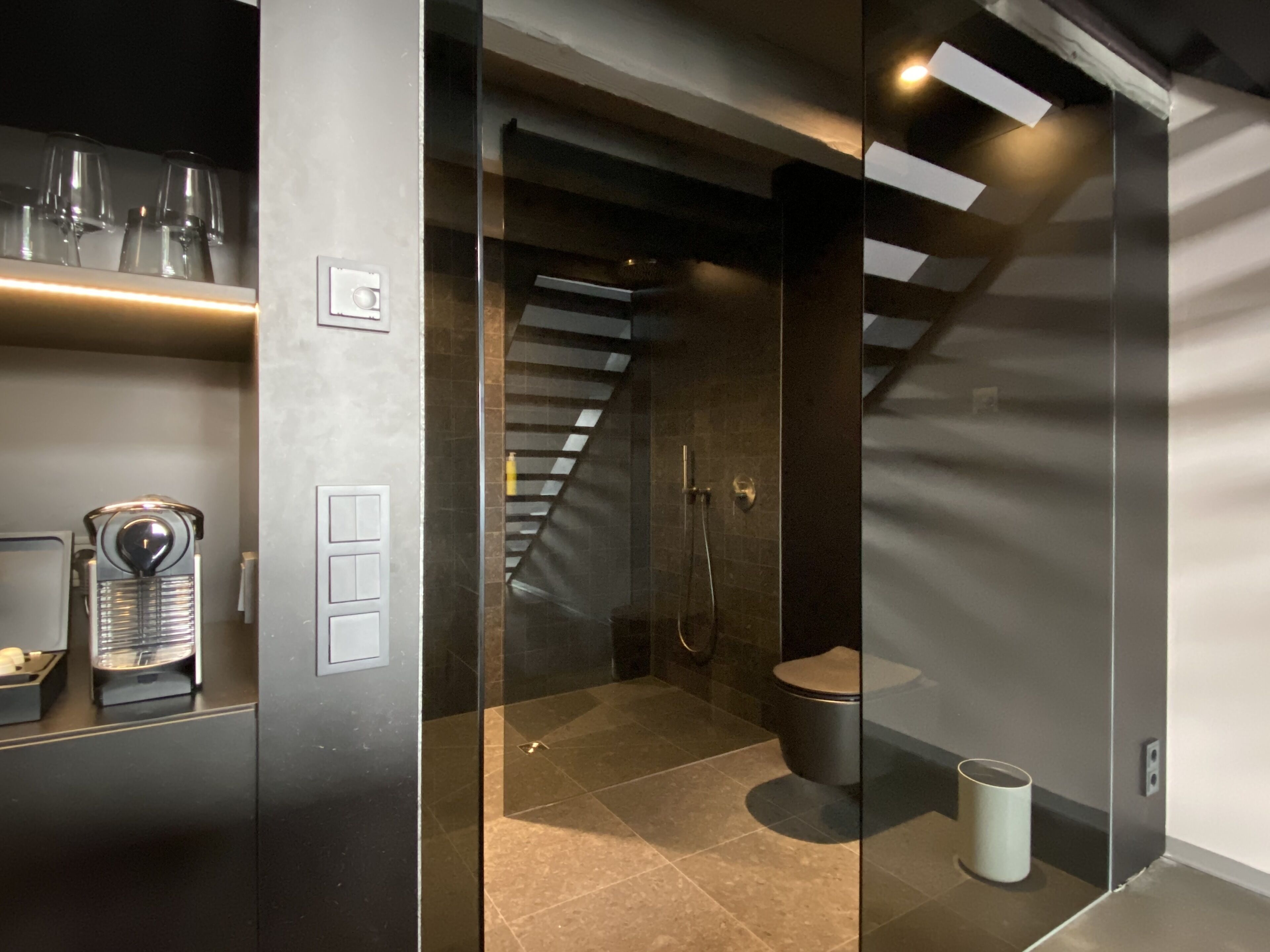 Designer toiletries, hair dryer, heated floors, towels