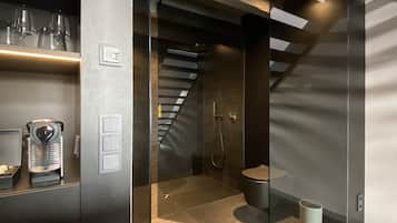 Designer toiletries, hair dryer, heated floors, towels