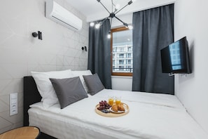 1 bedroom, premium bedding, blackout drapes, iron/ironing board